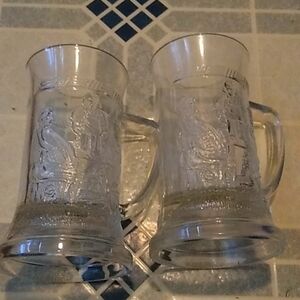 Two federal glass steins clear.